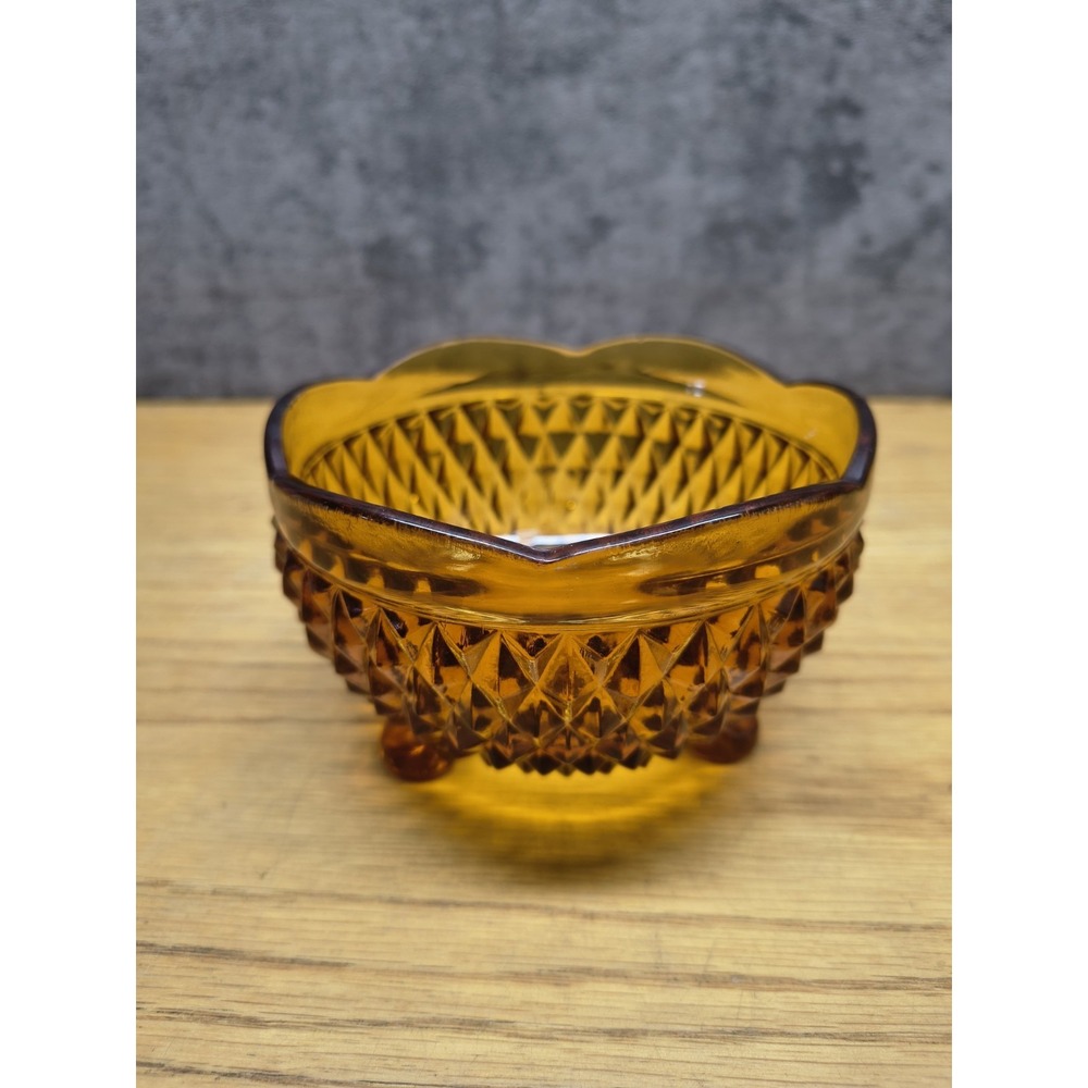 Amber glass diamond point footed bowl by Indiana Glass